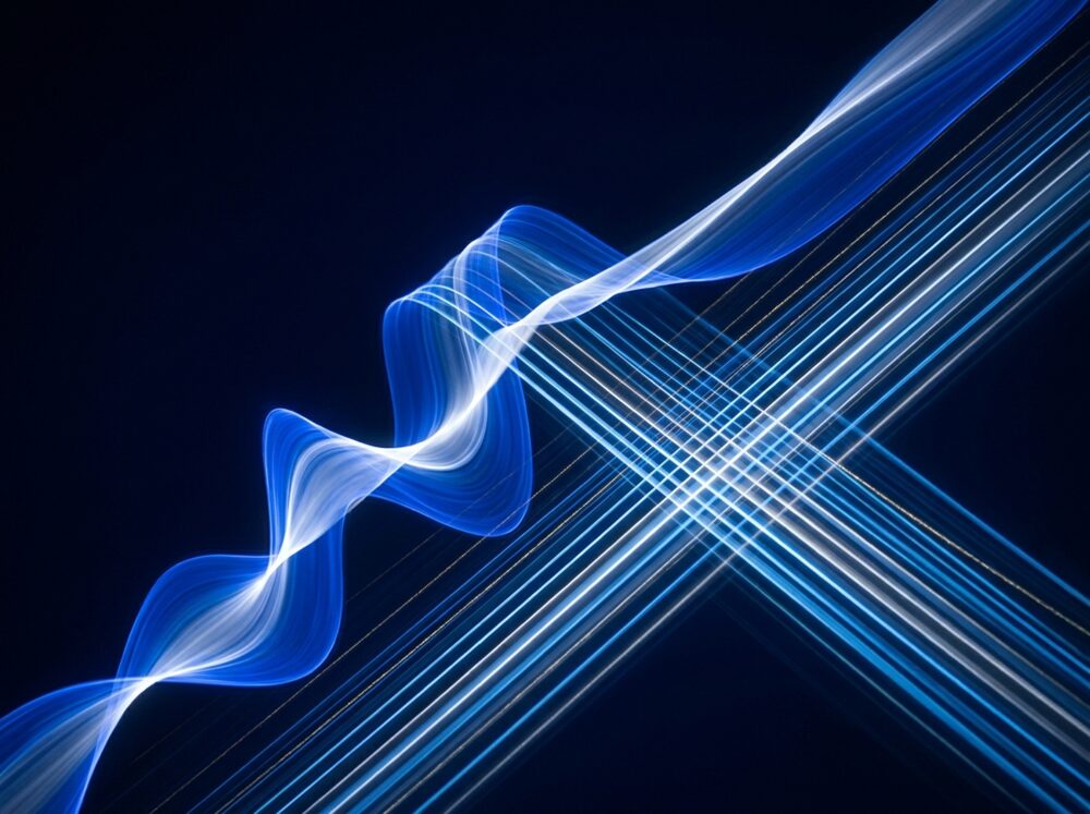 A voice waveform resolving into ordered lines of light